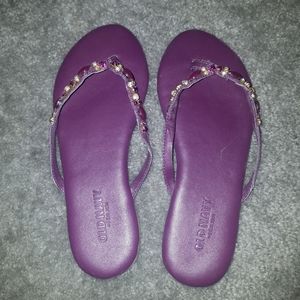 Purple flip flops